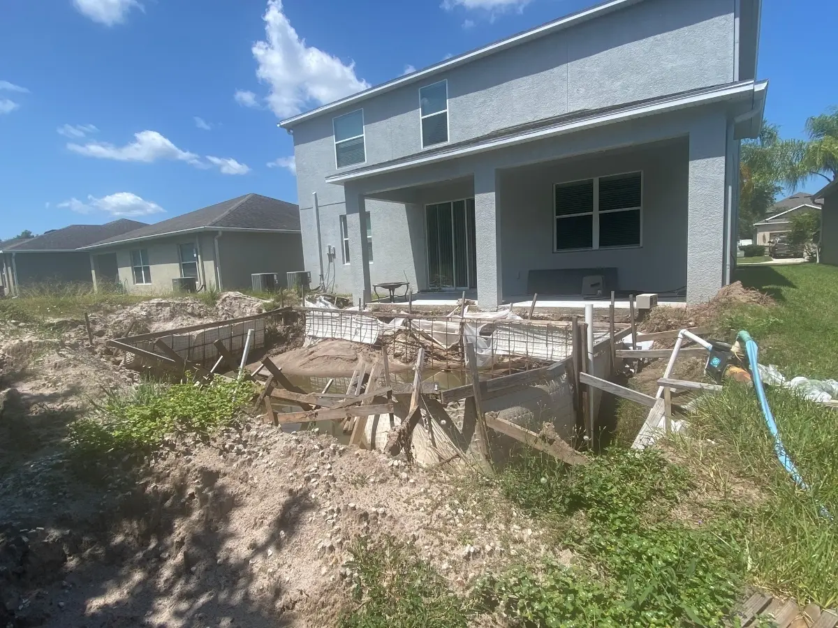 Unfinished pool construction project abandoned by failed pool builder in Tampa Bay